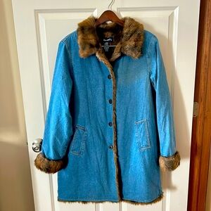 Denim coat with faux fur lining, cuffs and collar. Five button front closure.